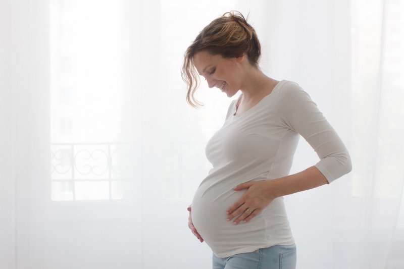 I’m Pregnant; Can I Be a Good Dental Implant Candidate?